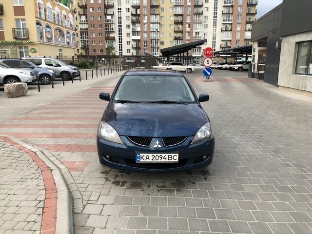 Синій Міцубісі Lancer, об'ємом двигуна 1.6 л та пробігом 358 тис. км за 2999 $, фото 1 на Automoto.ua