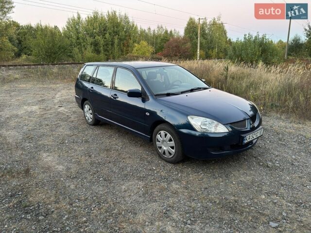 Синій Міцубісі Lancer, об'ємом двигуна 1.58 л та пробігом 199 тис. км за 3999 $, фото 1 на Automoto.ua