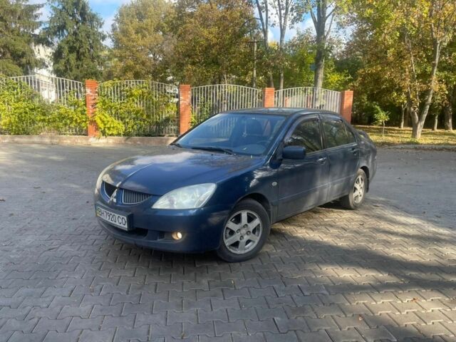 Синій Міцубісі Lancer, об'ємом двигуна 2 л та пробігом 237 тис. км за 3499 $, фото 1 на Automoto.ua