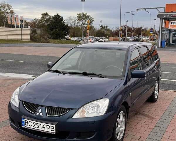 Синій Міцубісі Lancer, об'ємом двигуна 1.58 л та пробігом 220 тис. км за 2699 $, фото 1 на Automoto.ua