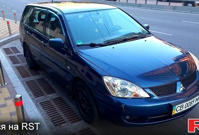 Синій Міцубісі Lancer, об'ємом двигуна 1.6 л та пробігом 245 тис. км за 3299 $, фото 1 на Automoto.ua