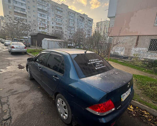 Синій Міцубісі Lancer, об'ємом двигуна 1.6 л та пробігом 267 тис. км за 4500 $, фото 1 на Automoto.ua