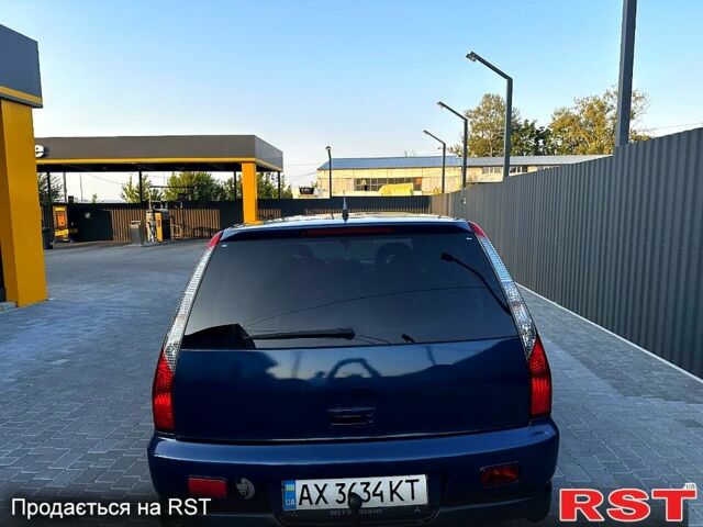 Синий Мицубиси Лансер, объемом двигателя 2 л и пробегом 330 тыс. км за 3400 $, фото 1 на Automoto.ua