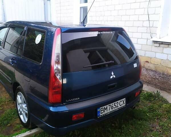 Синій Міцубісі Lancer, об'ємом двигуна 2 л та пробігом 201 тис. км за 4800 $, фото 1 на Automoto.ua