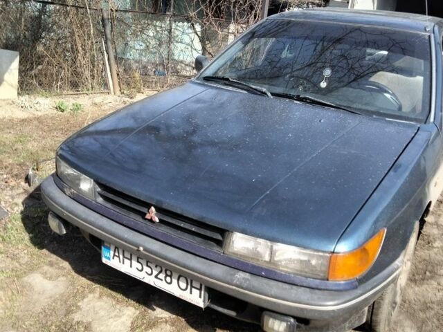 Синій Міцубісі Lancer, об'ємом двигуна 1 л та пробігом 300 тис. км за 1426 $, фото 1 на Automoto.ua