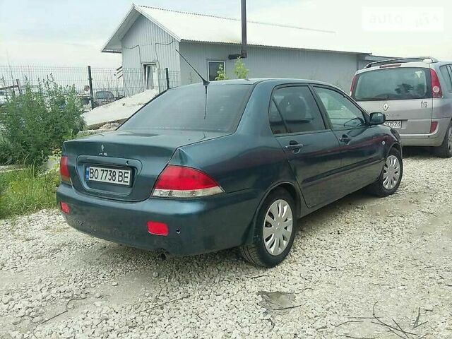 Синій Міцубісі Lancer, об'ємом двигуна 1.6 л та пробігом 300 тис. км за 5100 $, фото 1 на Automoto.ua