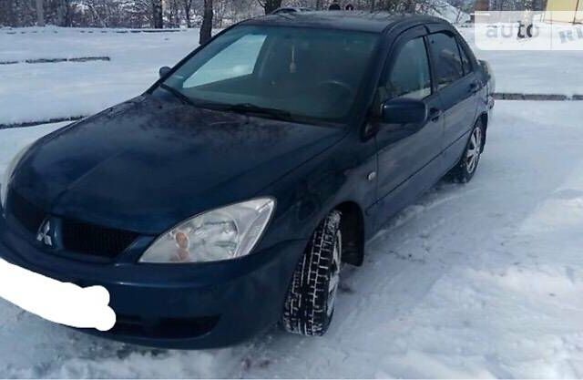 Синій Міцубісі Lancer, об'ємом двигуна 1.6 л та пробігом 186 тис. км за 5500 $, фото 1 на Automoto.ua