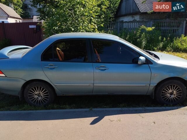 Зелений Міцубісі Lancer, об'ємом двигуна 1.58 л та пробігом 230 тис. км за 2300 $, фото 1 на Automoto.ua