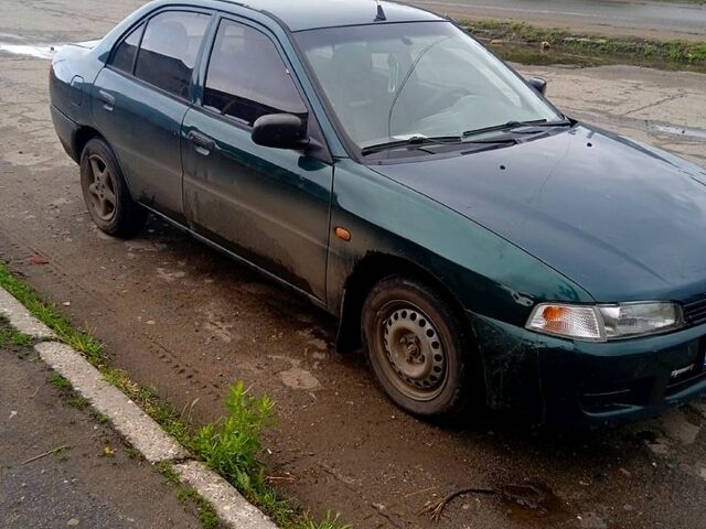 Мицубиси Лансер 1996 в Николаеве на Automoto.ua Зеленый Мицубиси Лансер, объемом двигателя 1.3 л и пробегом 100 тыс. км за 2000 $, фото 1 на Automoto.ua