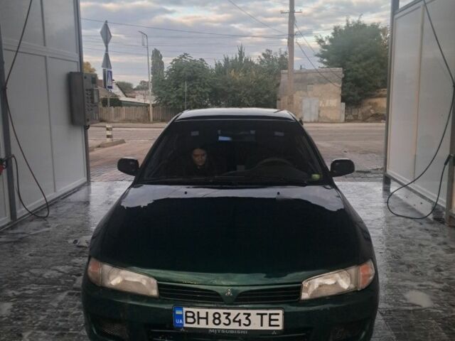 Зеленый Мицубиси Лансер, объемом двигателя 1.3 л и пробегом 400 тыс. км за 2300 $, фото 1 на Automoto.ua