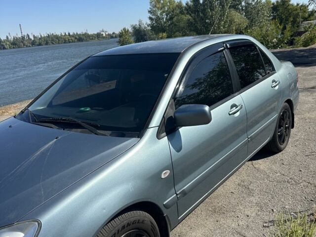 Зелений Міцубісі Lancer, об'ємом двигуна 1.6 л та пробігом 250 тис. км за 4788 $, фото 1 на Automoto.ua