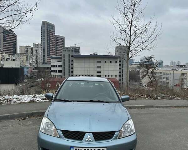 Зеленый Мицубиси Лансер, объемом двигателя 1.58 л и пробегом 207 тыс. км за 4200 $, фото 1 на Automoto.ua
