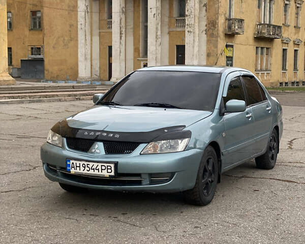 Міцубісі Lancer 2006 у Краматорске на Automoto.ua Зелений Міцубісі Lancer, об'ємом двигуна 1.58 л та пробігом 100 тис. км за 3700 $, фото 1 на Automoto.ua