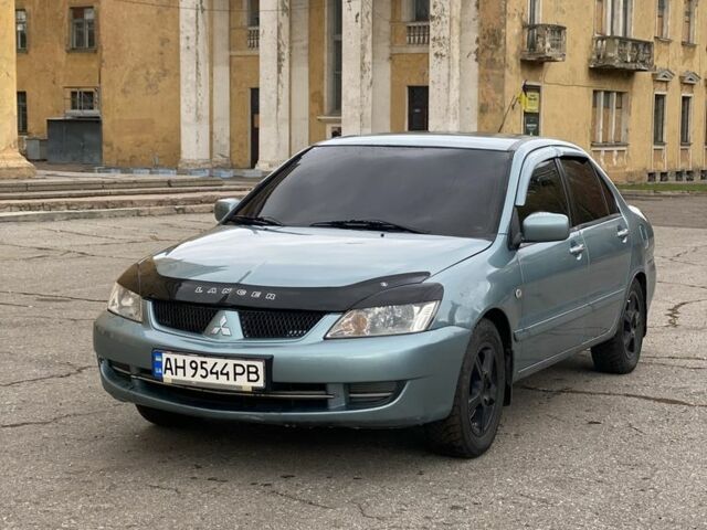 Зелений Міцубісі Lancer, об'ємом двигуна 1.6 л та пробігом 100 тис. км за 3700 $, фото 1 на Automoto.ua