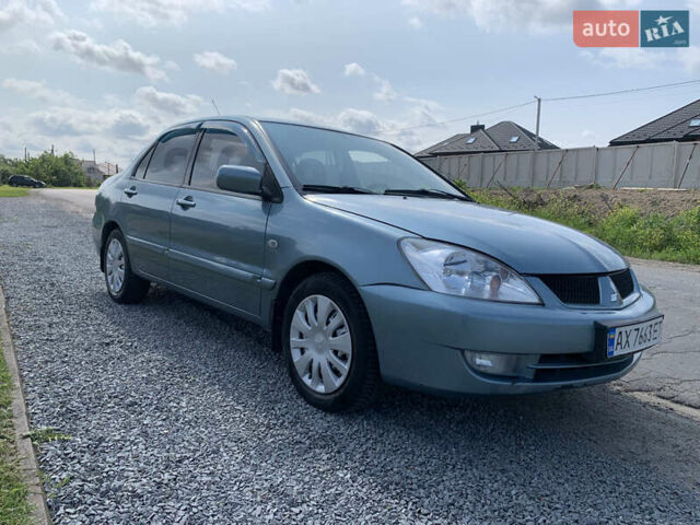 Зелений Міцубісі Lancer, об'ємом двигуна 1.6 л та пробігом 206 тис. км за 3850 $, фото 1 на Automoto.ua