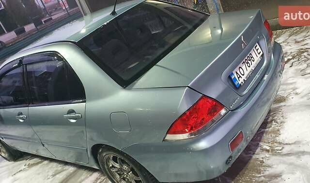 Зеленый Мицубиси Лансер, объемом двигателя 1.58 л и пробегом 352 тыс. км за 3700 $, фото 1 на Automoto.ua