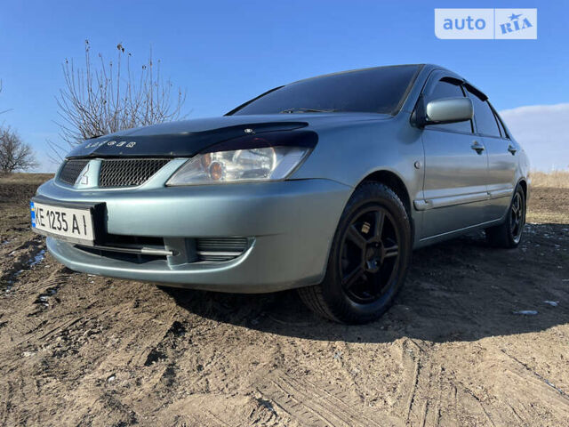 Зелений Міцубісі Lancer, об'ємом двигуна 1.58 л та пробігом 380 тис. км за 4600 $, фото 1 на Automoto.ua