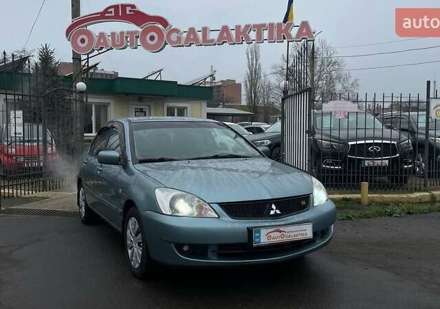 Зелений Міцубісі Lancer, об'ємом двигуна 1.6 л та пробігом 262 тис. км за 3999 $, фото 1 на Automoto.ua