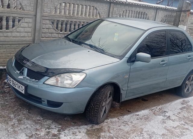 Зелений Міцубісі Lancer, об'ємом двигуна 1.6 л та пробігом 320 тис. км за 4500 $, фото 1 на Automoto.ua