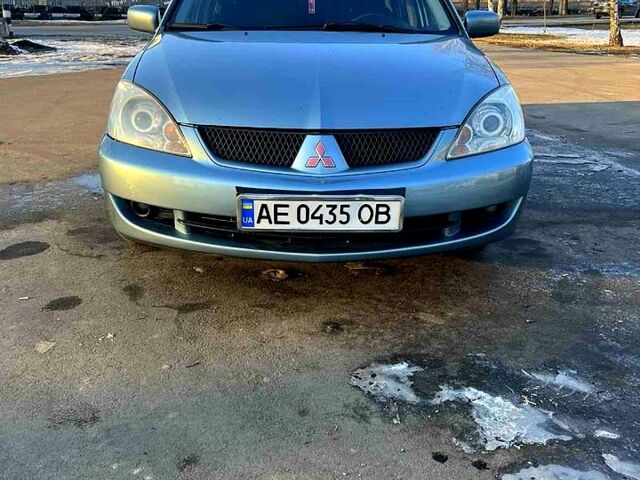 Зелений Міцубісі Lancer, об'ємом двигуна 16 л та пробігом 172 тис. км за 5900 $, фото 1 на Automoto.ua
