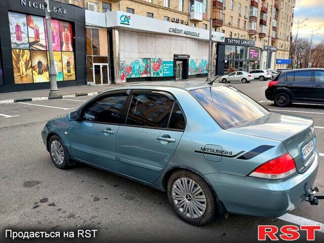 Зеленый Мицубиси Лансер, объемом двигателя 1.6 л и пробегом 203 тыс. км за 4100 $, фото 1 на Automoto.ua
