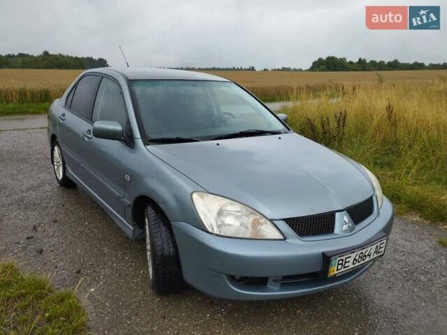 Зеленый Мицубиси Лансер, объемом двигателя 1.6 л и пробегом 135 тыс. км за 6931 $, фото 1 на Automoto.ua