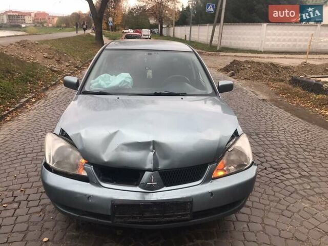 Зеленый Мицубиси Лансер, объемом двигателя 1.6 л и пробегом 184 тыс. км за 2000 $, фото 1 на Automoto.ua