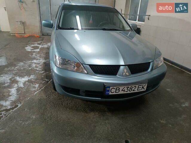 Зеленый Мицубиси Лансер, объемом двигателя 1.58 л и пробегом 218 тыс. км за 4600 $, фото 1 на Automoto.ua