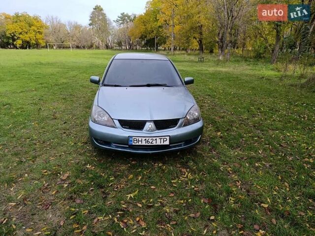 Міцубісі Lancer 2007 у Беляевке на Automoto.ua Зелений Міцубісі Lancer, об'ємом двигуна 2 л та пробігом 238 тис. км за 3400 $, фото 1 на Automoto.ua