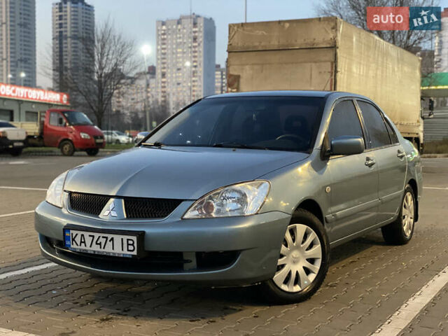 Зелений Міцубісі Lancer, об'ємом двигуна 1.58 л та пробігом 276 тис. км за 3400 $, фото 1 на Automoto.ua