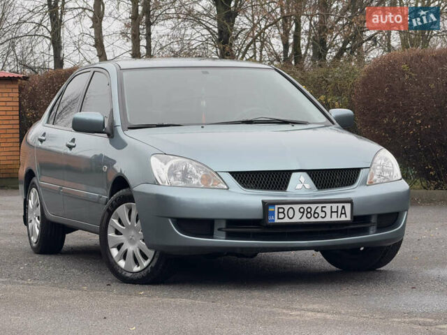 Зеленый Мицубиси Лансер, объемом двигателя 1.6 л и пробегом 214 тыс. км за 4150 $, фото 1 на Automoto.ua