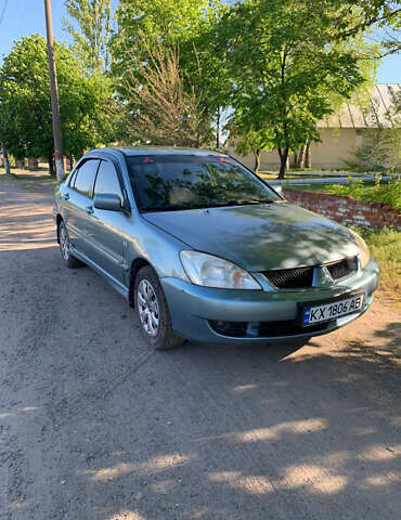 Зелений Міцубісі Lancer, об'ємом двигуна 1.6 л та пробігом 220 тис. км за 3700 $, фото 1 на Automoto.ua