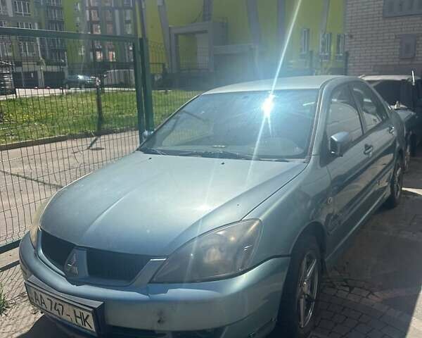 Зелений Міцубісі Lancer, об'ємом двигуна 2 л та пробігом 160 тис. км за 2000 $, фото 1 на Automoto.ua