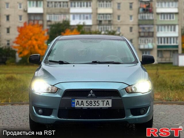 Зелений Міцубісі Lancer, об'ємом двигуна 2 л та пробігом 250 тис. км за 7200 $, фото 1 на Automoto.ua