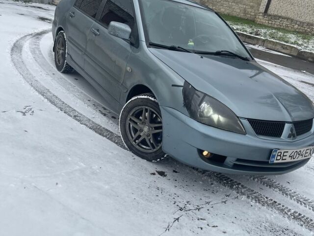 Зелений Міцубісі Lancer, об'ємом двигуна 1.6 л та пробігом 288 тис. км за 4500 $, фото 1 на Automoto.ua