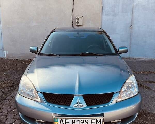 Зелений Міцубісі Lancer, об'ємом двигуна 1.6 л та пробігом 214 тис. км за 3800 $, фото 1 на Automoto.ua