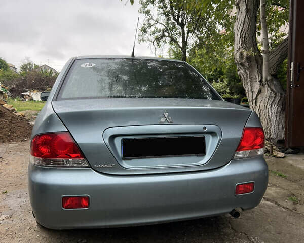 Зелений Міцубісі Lancer, об'ємом двигуна 1.6 л та пробігом 217 тис. км за 5400 $, фото 1 на Automoto.ua