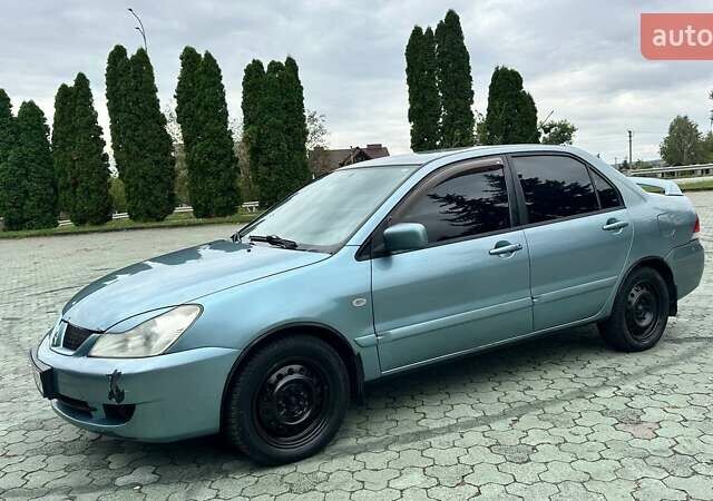 Зелений Міцубісі Lancer, об'ємом двигуна 1.58 л та пробігом 207 тис. км за 3400 $, фото 1 на Automoto.ua
