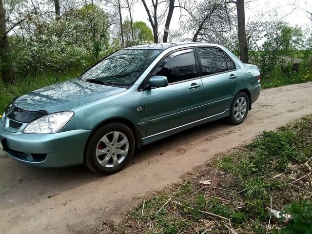 Зелений Міцубісі Lancer, об'ємом двигуна 1.6 л та пробігом 217 тис. км за 5400 $, фото 1 на Automoto.ua