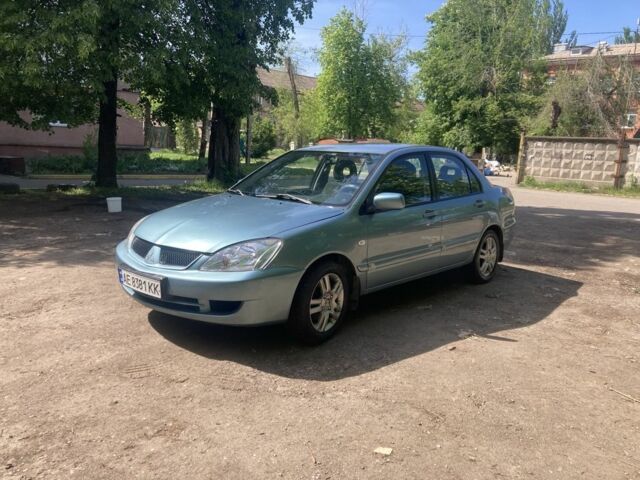 Зелений Міцубісі Lancer, об'ємом двигуна 0.16 л та пробігом 262 тис. км за 4600 $, фото 1 на Automoto.ua