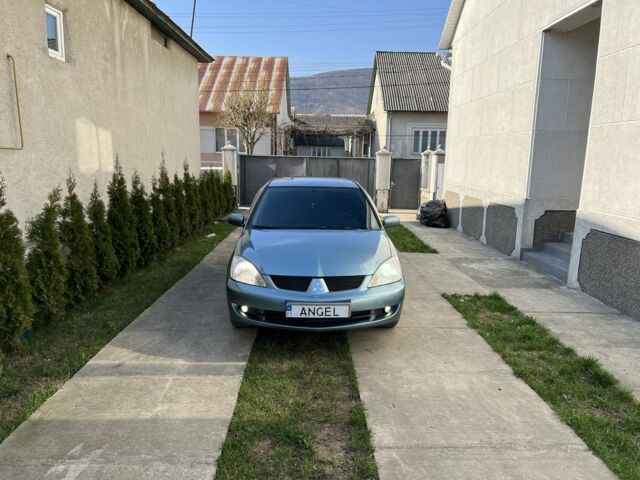 Зелений Міцубісі Lancer, об'ємом двигуна 1.6 л та пробігом 240 тис. км за 3000 $, фото 1 на Automoto.ua