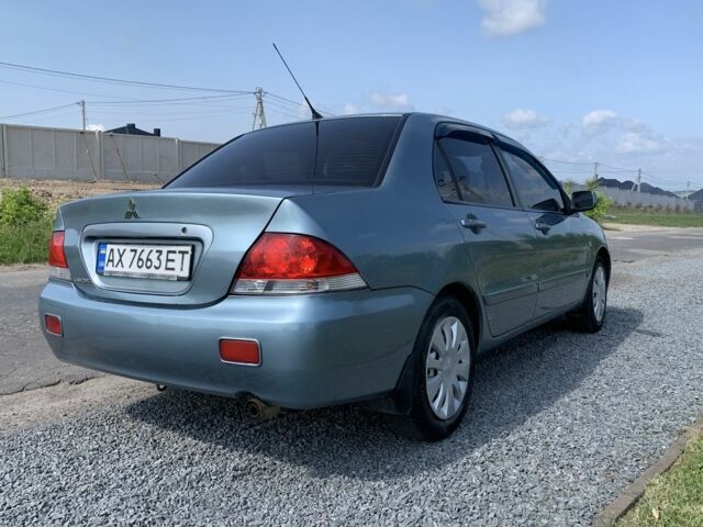 Зелений Міцубісі Lancer, об'ємом двигуна 1.6 л та пробігом 206 тис. км за 4499 $, фото 1 на Automoto.ua