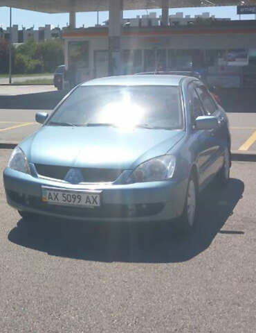 Зеленый Мицубиси Лансер, объемом двигателя 0 л и пробегом 165 тыс. км за 5456 $, фото 1 на Automoto.ua