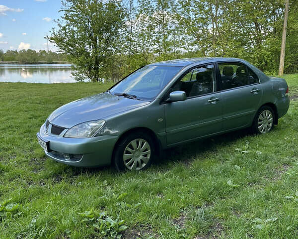 Зелений Міцубісі Lancer, об'ємом двигуна 1.6 л та пробігом 275 тис. км за 4000 $, фото 1 на Automoto.ua