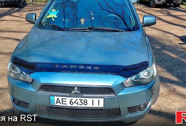 Зеленый Мицубиси Лансер, объемом двигателя 1.5 л и пробегом 188 тыс. км за 6100 $, фото 1 на Automoto.ua