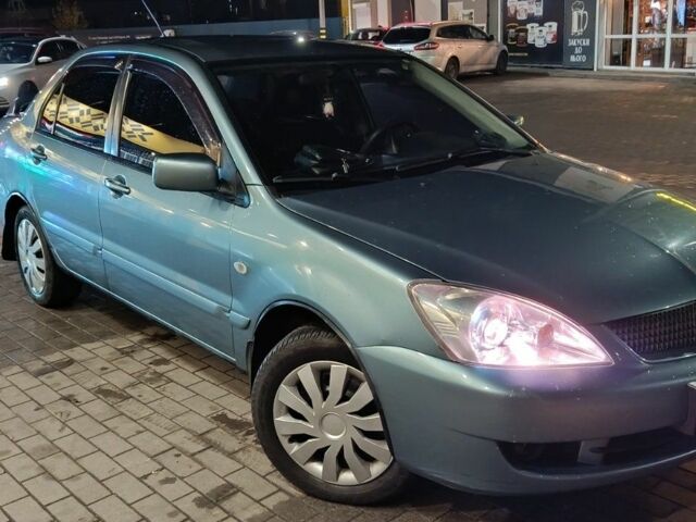 Зелений Міцубісі Lancer, об'ємом двигуна 1.6 л та пробігом 203 тис. км за 3700 $, фото 1 на Automoto.ua