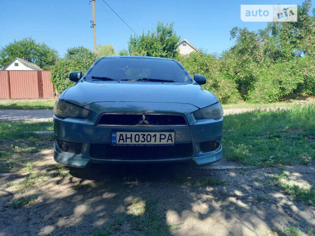 Зелений Міцубісі Lancer, об'ємом двигуна 1.9 л та пробігом 204 тис. км за 7000 $, фото 1 на Automoto.ua