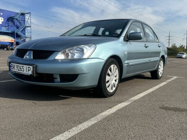 Зелений Міцубісі Lancer, об'ємом двигуна 1.6 л та пробігом 255 тис. км за 3800 $, фото 1 на Automoto.ua