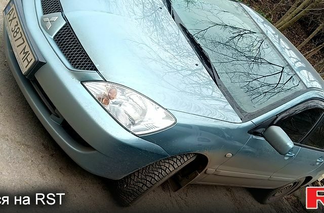 Зеленый Мицубиси Лансер, объемом двигателя 1.6 л и пробегом 176 тыс. км за 4800 $, фото 1 на Automoto.ua