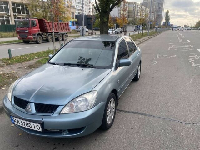 Зеленый Мицубиси Лансер, объемом двигателя 1.6 л и пробегом 167 тыс. км за 3500 $, фото 1 на Automoto.ua